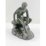 A 20th century bronze figure of a nude seated male