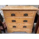 An early 20th century pine chest of drawers, with