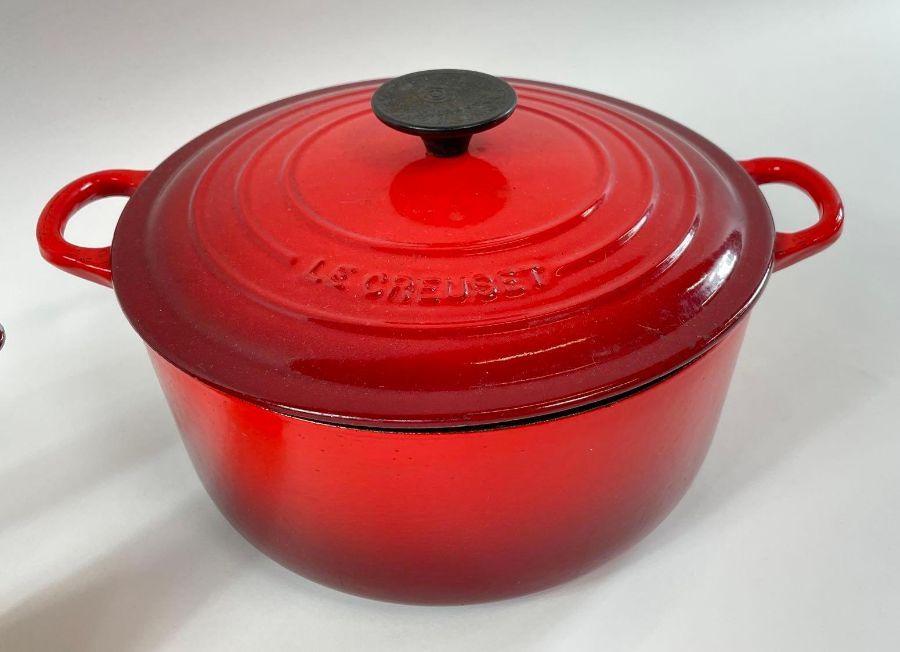 A red two handled Le Creuset cooking pot, along wi - Image 2 of 7