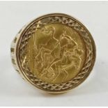A 9ct gold ring mount with a George V 1913 half so