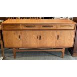 A mid century G Plan teak sideboard, set with two