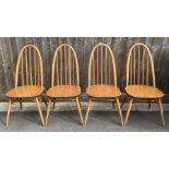 A set of four Ercol elm and beech chairs