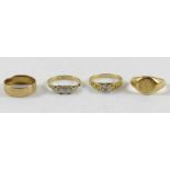 Four 18ct gold rings, to include a wedding band, s