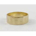 A 9ct gold wedding band, with facetted and line de