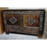 An 18th century and later carved coffer, with sing