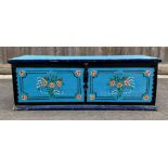 A 20th century painted and iron bound pine trunk,