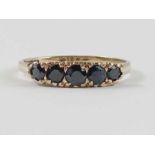 A 9ct gold sapphire graduated five stone ring with
