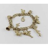 A 9ct gold filed double link charm bracelet with h