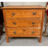 A 20th century pine chest of drawers, with long dr