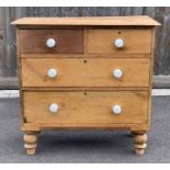 A Victorian pine chest of two short and two long d