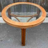 A mid century Nathan teak glazed circular coffee t