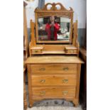 An early 20th century pine dressing table, with mi
