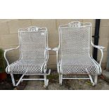 A pair of pierced iron garden chairs possibly Victorian