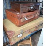3 vintage suitcases