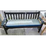 Hardwood garden bench with fitted cushion