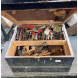 Wooden tool chest including hand tools