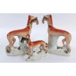 A pair of 19th century Staffordshire models of grey