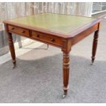 A 20th century mahogany square desk/table, with fo