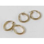 Two pairs of 9 carat gold hoop earrings, stamped ‘