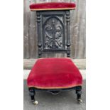 A Victorian Prey De Lieu Chair with carved cross t