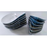 A collection of twelve French ceramic mussel dishes