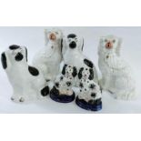 A pair of 19th century Staffordshire spaniel dogs,