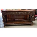 A 19th century oak carved sideboard, with two sing