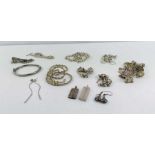 A collection of silver and silver coloured jewelle