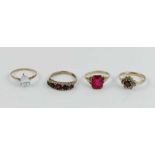 A 9 carat gold five stone garnet ring, finger size