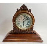 A 19th century mantle clock, with silvered dial an