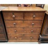 A 20th century oak chest of drawers, of two short