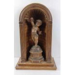 A 19th century hardwood carving of putti playing c