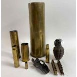 A collection of copper gun shells, castings and a