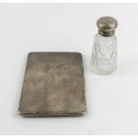 A silver cigarette case, 157g (5troy ozs); a toile