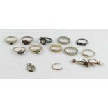 A collection of five 9 carat gold rings, some ston