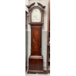 A longcase clock in a longcase clock, in oak case,