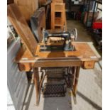 Singer treadle base sewing table with oak top
