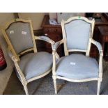 Pair of French style painted and upholstered open