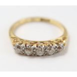 A five stone diamond ring, stamped ‘18ct', the old