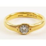 A 22 carat gold ring, set with an old cut diamond,