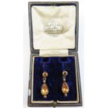 A pair of early Victorian foil backed topaz drop e