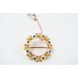 A sapphire and seed pearl circular wreath brooch,