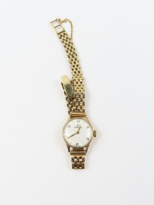 Omega, a ladies 9ct gold wrist watch, the round wh - Image 9 of 9