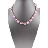 An amethyst set riviere necklace, the graduated st