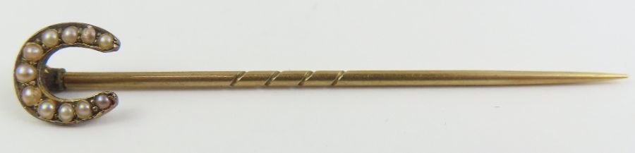 A pin, stamped ’9ct’, 1.2 g gross; with three stic - Image 2 of 12