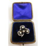 A late Victorian diamond and pearl clover brooch,