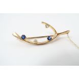 A sapphire and diamond ‘now make a wish’ wishbone