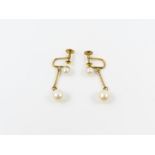A pair of cultured pearl drop earrings, stamped ’1
