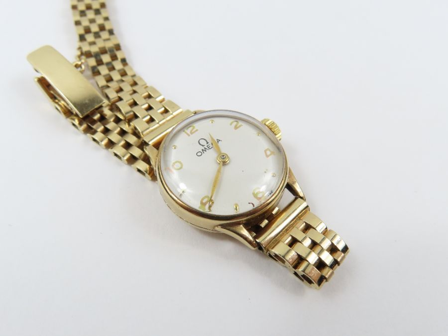 Omega, a ladies 9ct gold wrist watch, the round wh - Image 2 of 9