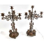 A pair of early 20th century iron and brass gothic